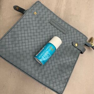 Moroccanoil Dry Texture in Blue and Orange and cosmetic bag